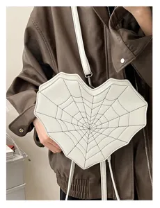 White heart spiderweb crossbody bag, dark sweet cool bat shoulder bag detail view.