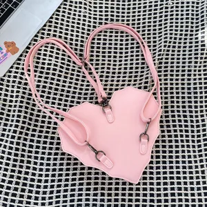 Pink heart-shaped multi-functional PU leather backpack and stylish shoulder bag.
