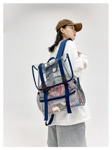 Transparent PVC backpack for women, clear school rucksack with blue straps and stylish design.