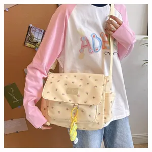 Japanese style sweet floral canvas messenger bag with large capacity and cute shoulder strap.