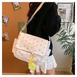 Japanese style sweet floral messenger bag detail, canvas casual crossbody bag with cute pendant.