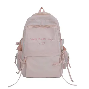Leuke roze casual rugzak met borduurwerk en linten, lichte schooltas voor studenten.