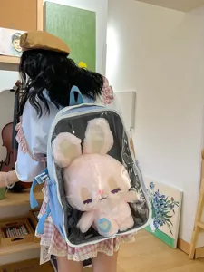 Japanese style transparent backpack with plush rabbit doll, cute ita bag for school students.
