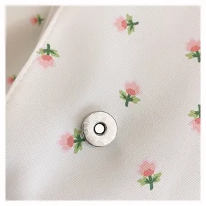 Floral fabric messenger bag detail with snap button, Japanese style cute student bag.