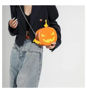 Detailed view of the Halloween pumpkin crossbody bag, featuring vibrant contrast colors.