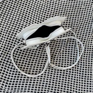 White heart bat crossbody bag multi-functional gothic style women shoulder bag detail shot