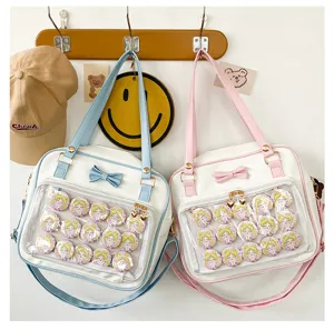Clear window Ita bag, cute bow PU leather shoulder handbag with anime badges for daily wear.