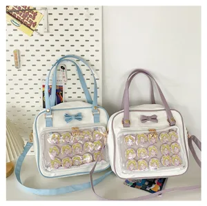 Cute bow ita bag with transparent pocket, Sailor Moon badges detail, PU leather shoulder bag.