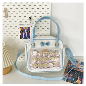 Sweet bow ita bag with clear transparent front pocket and cute anime badges inside