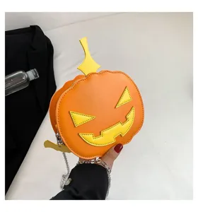Close-up detail of the Halloween pumpkin crossbody bag with metal chain and cute face design.