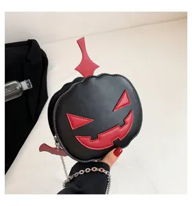 Halloween funny pumpkin shoulder bag, unique color block design with chain strap, detail view.