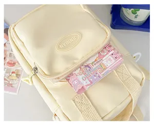 Cute yellow 20cm cotton doll ita bag detail, sweet girl crossbody bag with front pocket.