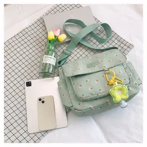 Japanese style floral crossbody messenger bag with large capacity for student daily use.