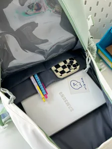 Detailed view of the school backpack interior showcasing spacious compartments and laptop sleeve.
