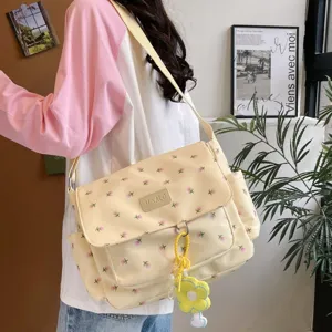Japanese ins style floral canvas messenger bag, large capacity student crossbody shoulder bag.