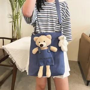 Bolso cruzado de lona lindo para mujer con muñeco de oso de peluche, bolso de hombro estudiantil.