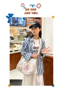 Cute Japanese anime ita canvas crossbody shoulder bag with clear window for daily use.