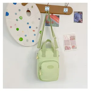 Light green canvas crossbody bag for 20cm cotton dolls, cute casual small shoulder bag.
