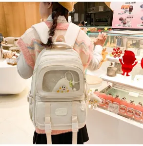 Campus style multi-functional beige canvas ita bag with clear window and cute pendants for daily wear.