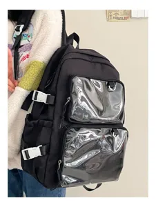 Detail view of black ita backpack with clear transparent front pockets and secure buckles for girls.