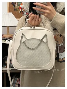Details of white PU leather cute cat shaped ita bag with clear window and chain strap.