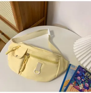 Sac de poitrine décontracté en nylon pour femmes, sac banane bandoulière jaune polyvalent.