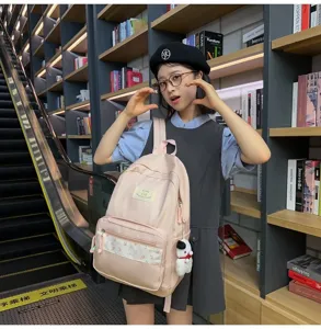Korean ins pink student backpack with floral patchwork, cute casual school bag for teen girls.