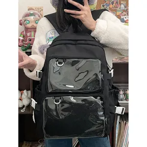 Clear ita backpack for women, black school bookbag with transparent window for pins and badges.