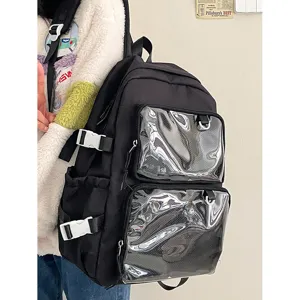 Black Ita backpack with clear vinyl pockets for anime badges, pins and kawaii plush toys.