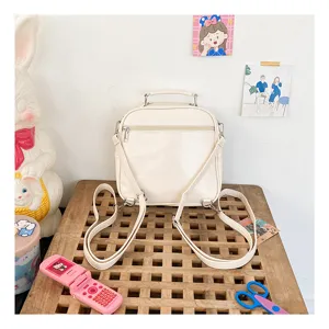 White PU leather mini backpack, versatile cute daypack for women, casual daily school bag.