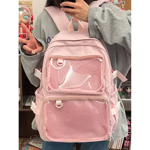 Japanese pink Ita backpack with clear mesh pockets for cute anime badges student daily school bag