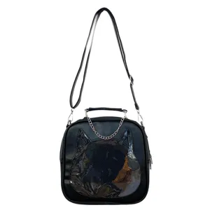 Close-up of black PU handbag with cute cat transparent window and chain detail, versatile design.
