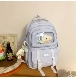 Light blue student ita backpack with transparent window, large capacity daily use.