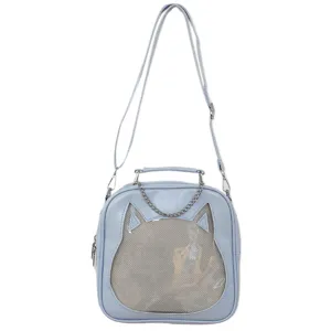 Cute cat ear transparent itabag detail, light blue PU leather crossbody bag with mesh window.