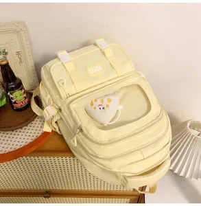 Yellow canvas school backpack cute student daypack multi compartment casual book bag.