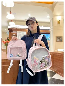Pink transparent PVC JK uniform ita backpack with clear display window for pins and dolls.