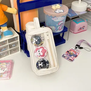 Διαφανής κασετίνα καμβά ita bag με παράθυρο για σχολικά είδη και κονκάρδες anime.