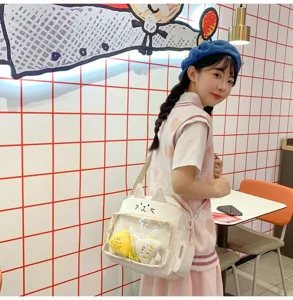 Cute white cat ita bag with transparent window, sweet JK style crossbody bag for daily use.