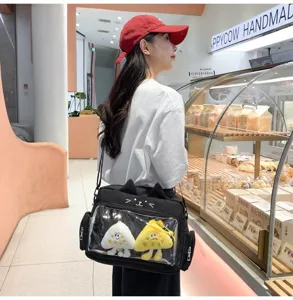 Black cat ear transparent ita bag with cute plush charms, versatile crossbody bag for daily use.