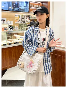 Cute Japanese anime ita bag for women, white canvas crossbody shoulder bag with clear window.