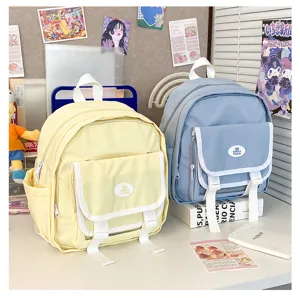 Mini casual canvas backpacks detail view featuring cute flap pockets and vibrant pastel colors.