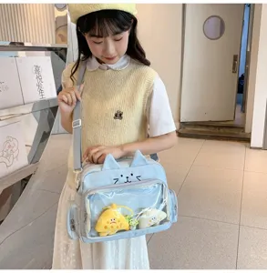 Cute blue cat ear ita bag with transparent pocket and plush pendants for daily JK style wear.