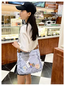 Kawaii ita bag for women, cute purple ruffled crossbody bag with clear window for pins.