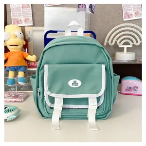 Green JK uniform mini backpack canvas itabag with clear window and white straps.