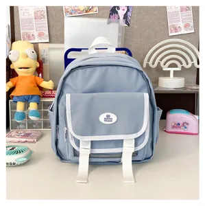 Light blue JK uniform mini backpack ita bag detail view, cute school bag with front pocket.