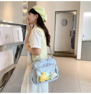 Cute cat ear ita bag with transparent window, sweet style crossbody shoulder bag for anime fan.