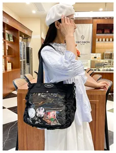 Japanese anime ita bag black canvas shoulder crossbody bag with clear transparent front pocket for pins.