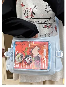 Light blue canvas ita bag with clear window for anime badges, cute school messenger bag.