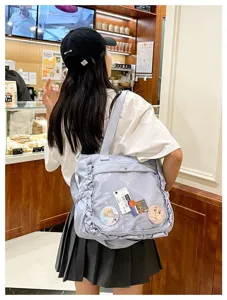 Cute Japanese ita bag with clear window and badges, casual canvas crossbody shoulder bag.