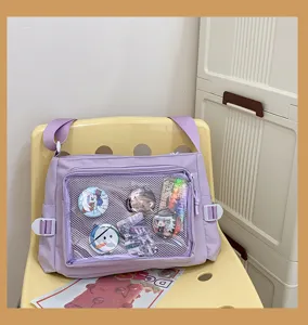 Purple canvas ita bag with clear mesh front pocket for anime badges, casual crossbody bag.